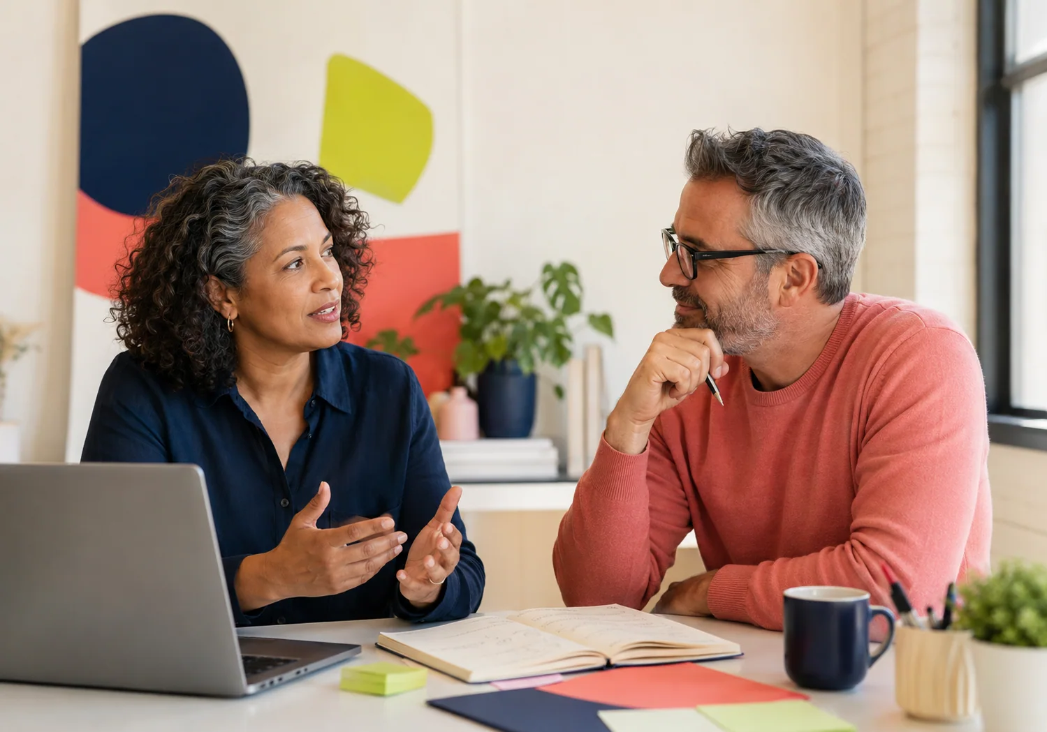 A business owner discussing website visibility with a strategist
